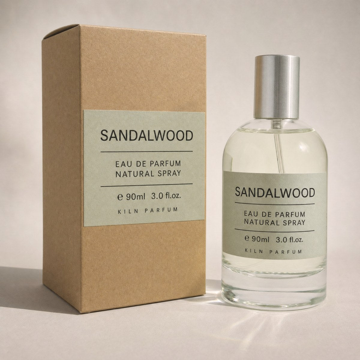 Kiln Parfum Sandalwood in clear glass with its kraft carton